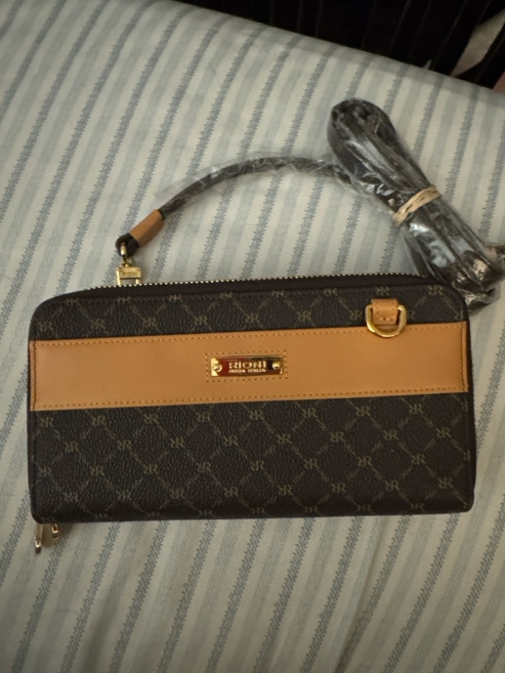 Rioni Brown Monogram Wristlet with Tan Accent